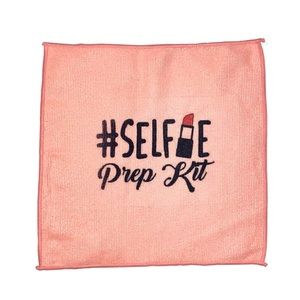 Set of four peach pink microfiber washcloths